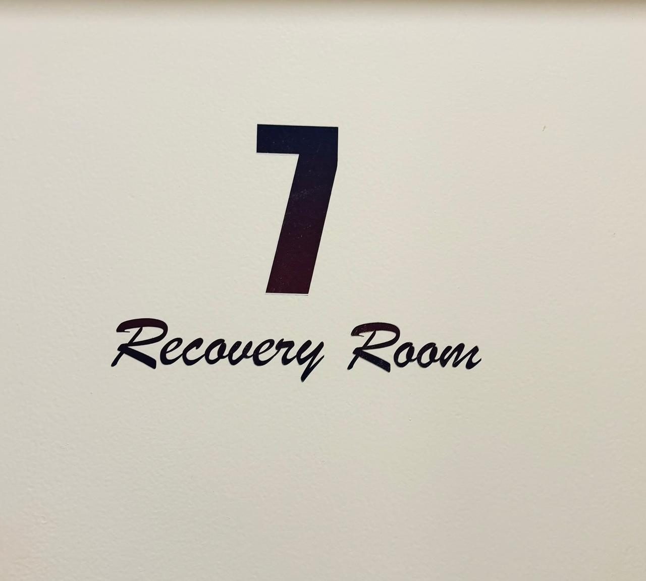 Wall sign reading 7, Recovery Room